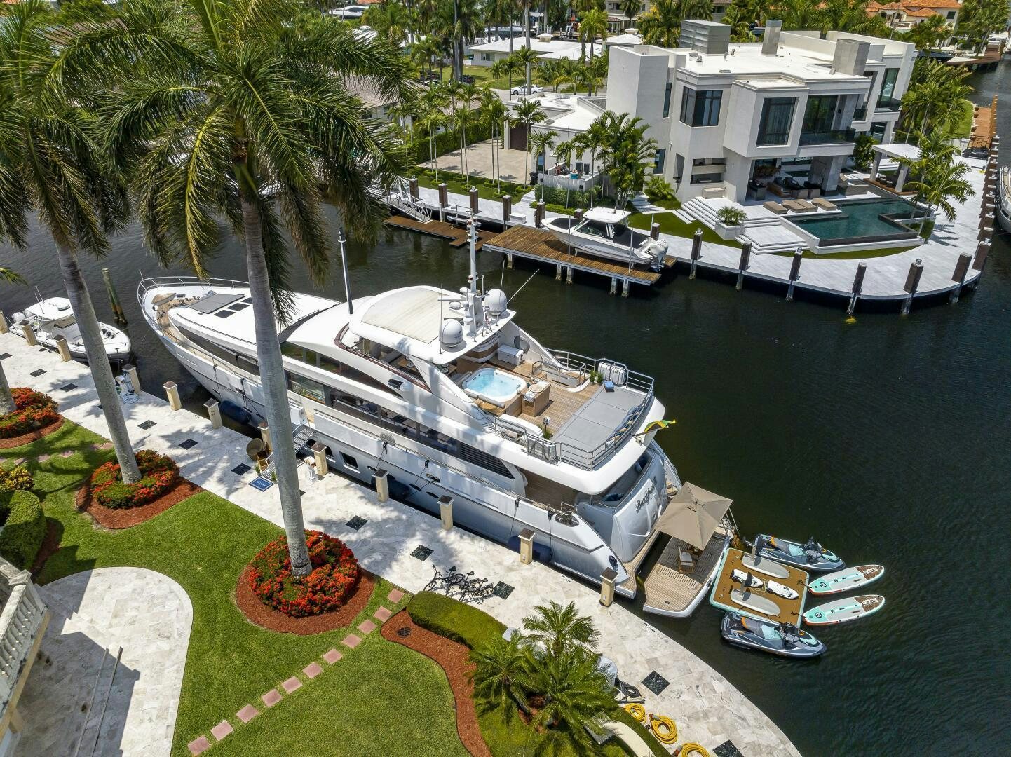 a boat docked at a pier aboard BEACHFRONT II Yacht for Sale