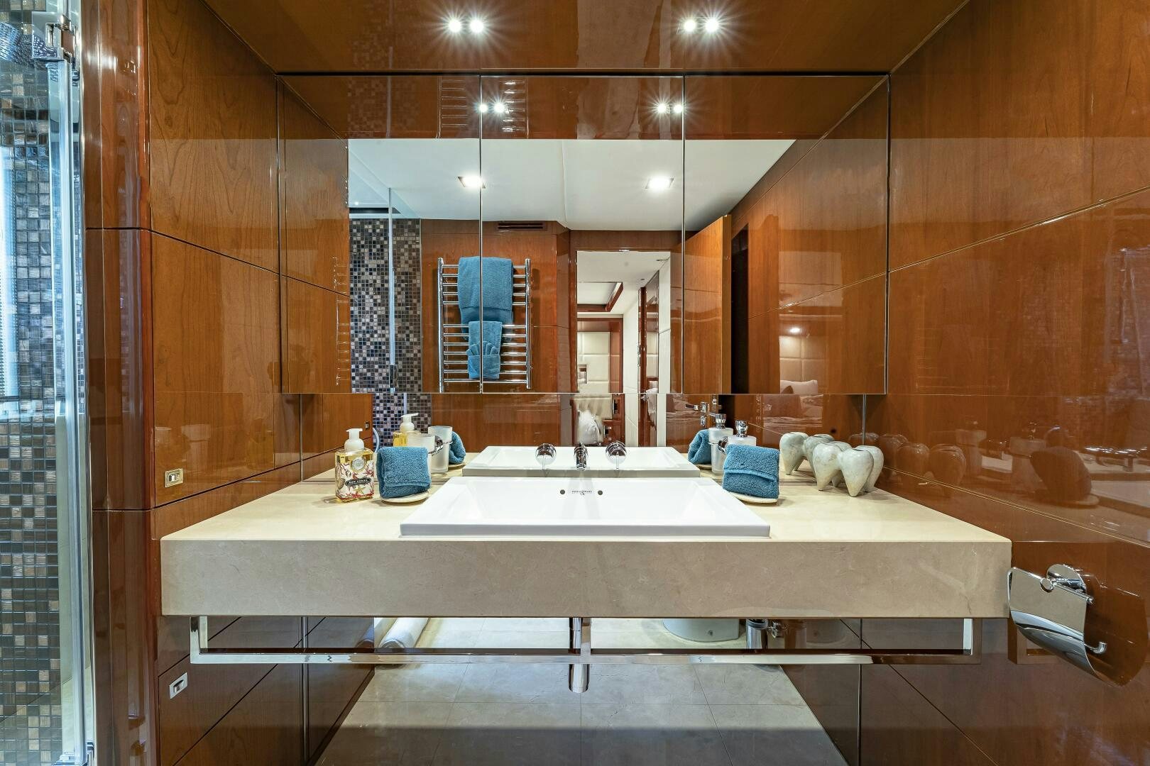 a large bathroom with a large counter aboard BEACHFRONT II Yacht for Sale