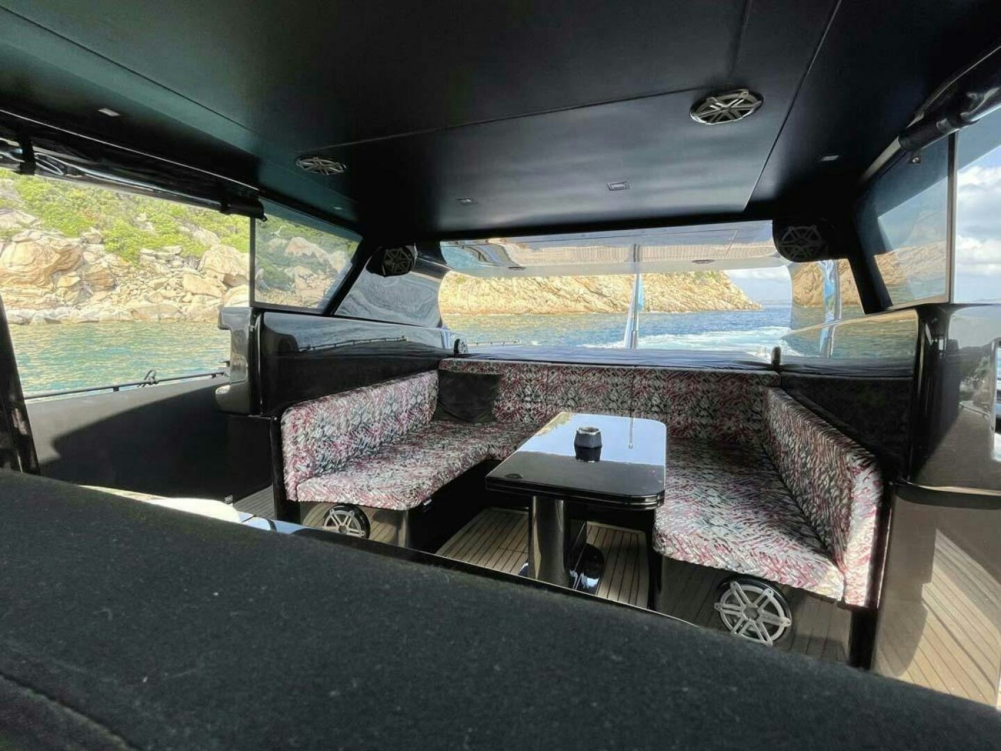 a vehicle with a table and a bench aboard FOREVER 32 Yacht for Sale