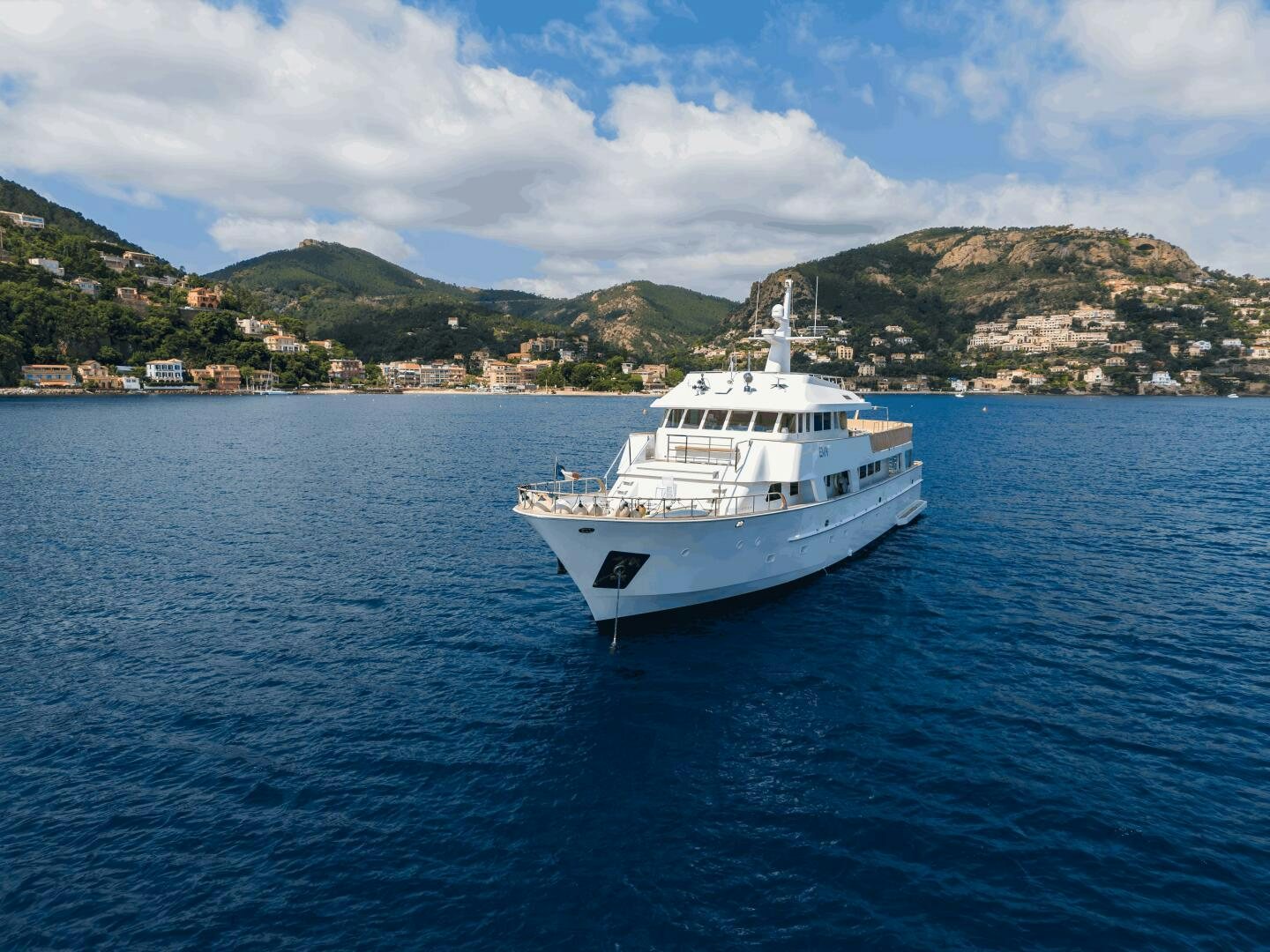 a white boat in the water aboard EVA Yacht for Sale