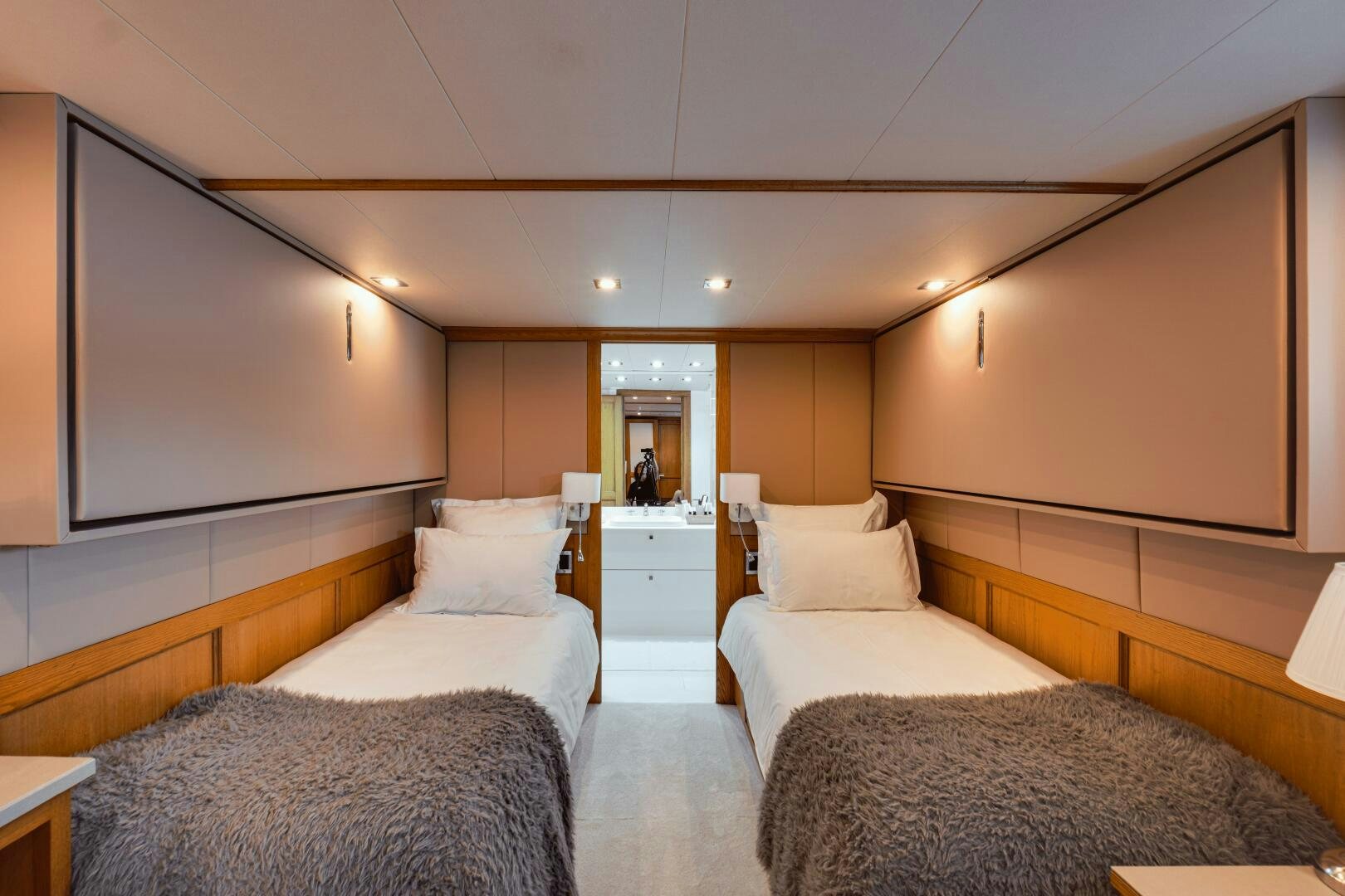 a room with several beds aboard EVA Yacht for Sale
