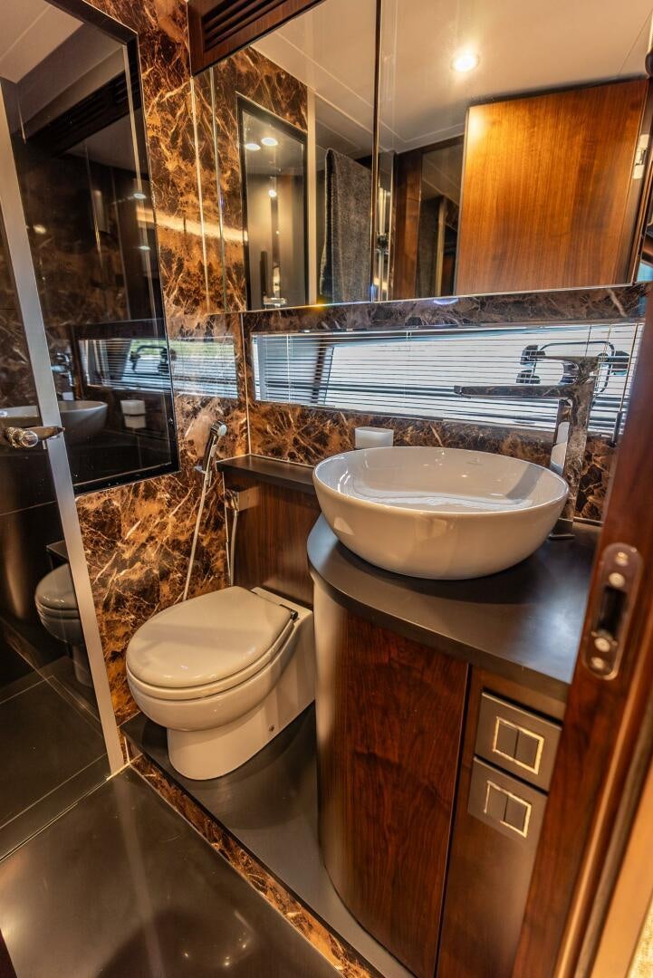 a bathroom with a sink and toilet aboard NOROADER Yacht for Sale