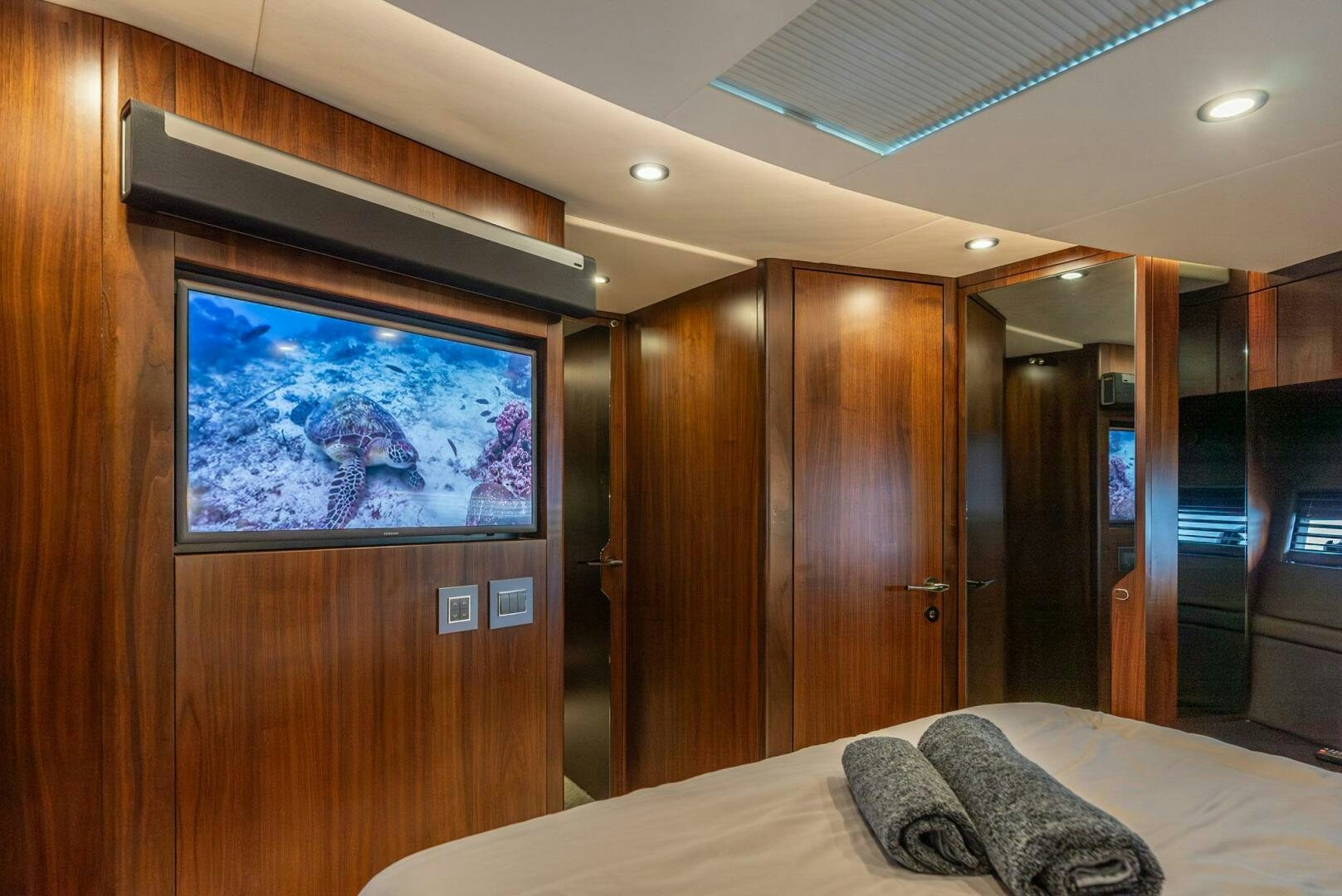 a bed in a room aboard NOROADER Yacht for Sale