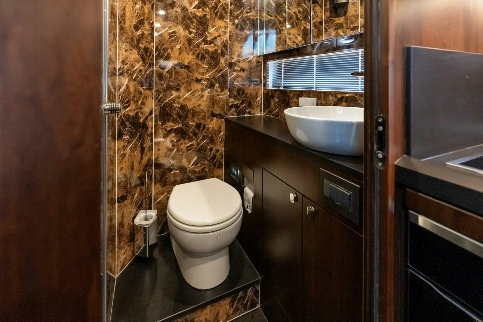 a bathroom with a sink toilet and a bathtub aboard NOROADER Yacht for Sale