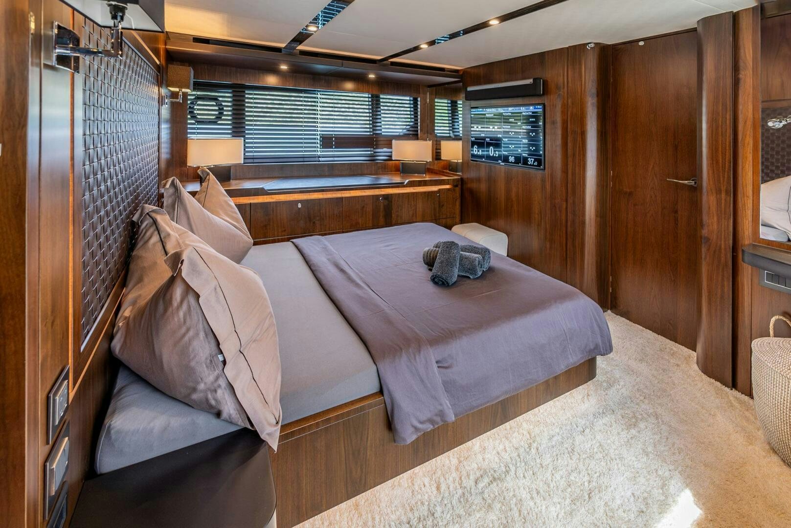 a bed in a room aboard NOROADER Yacht for Sale