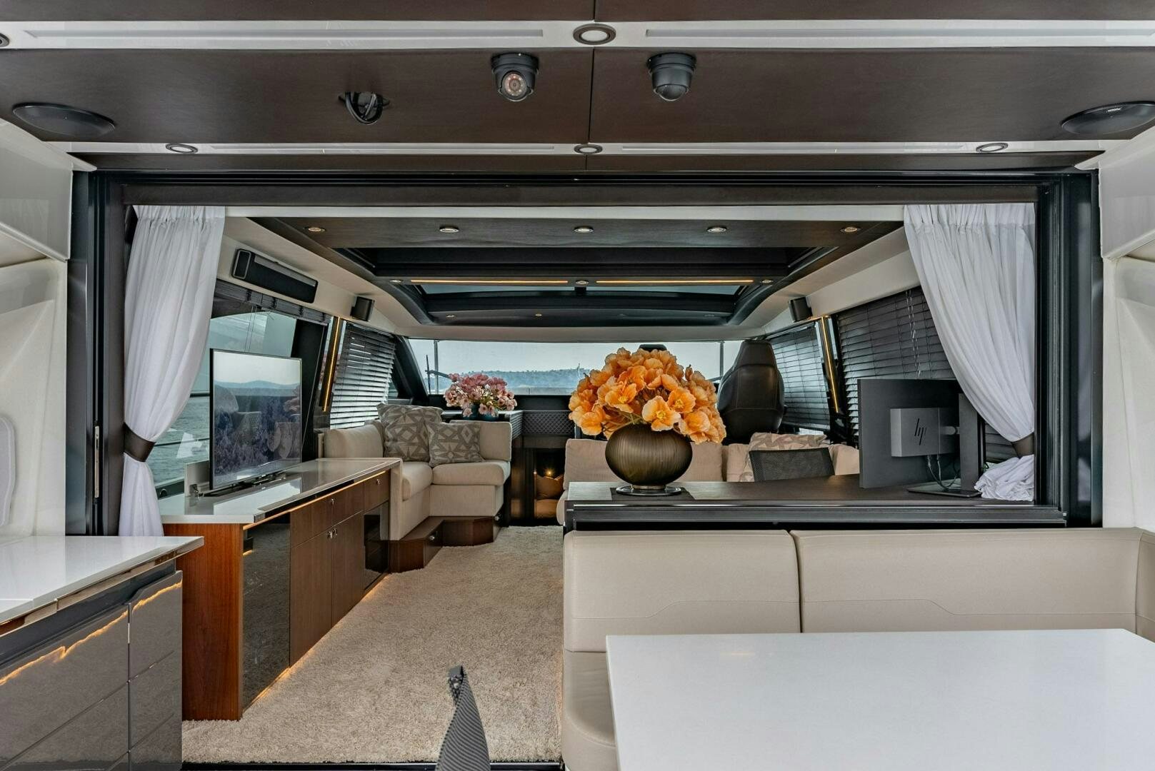 a kitchen with a large fireplace aboard NOROADER Yacht for Sale