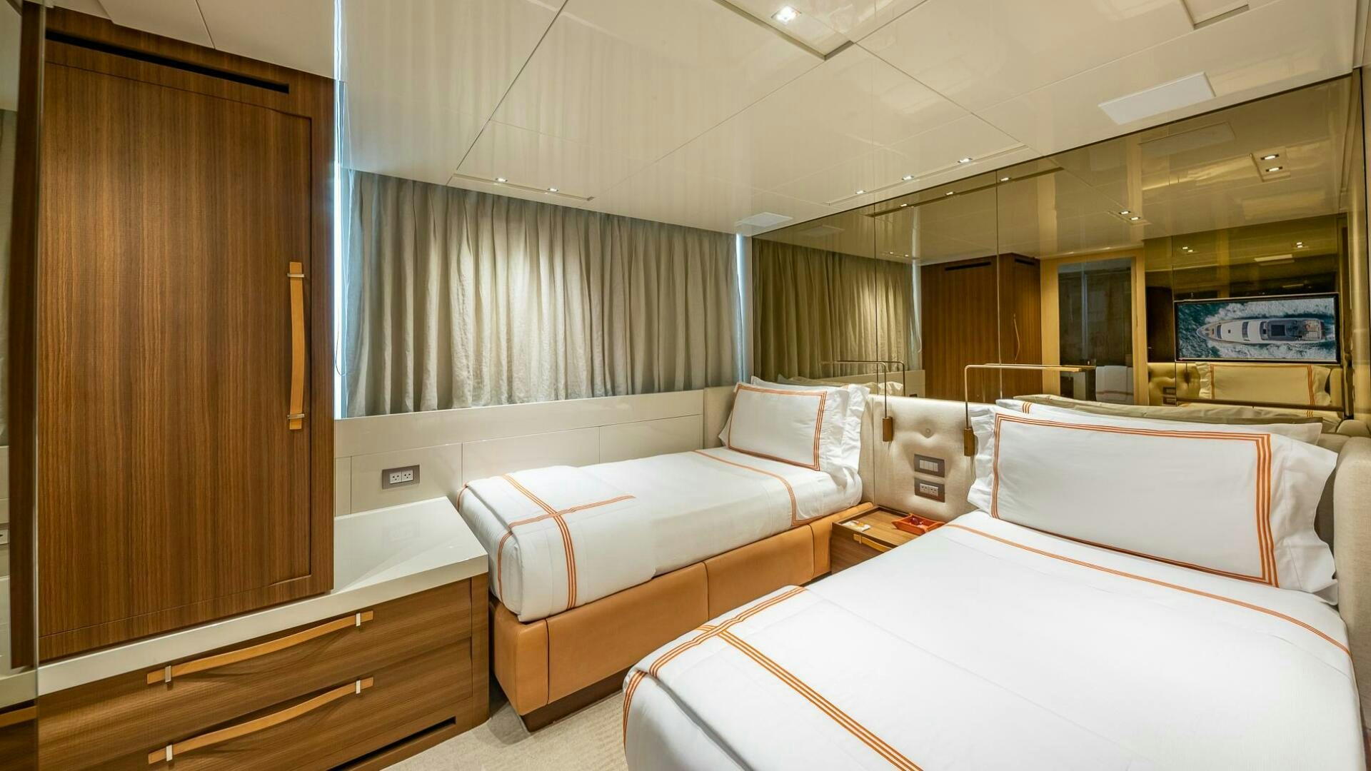 a room with two beds aboard WOMBAT Yacht for Sale