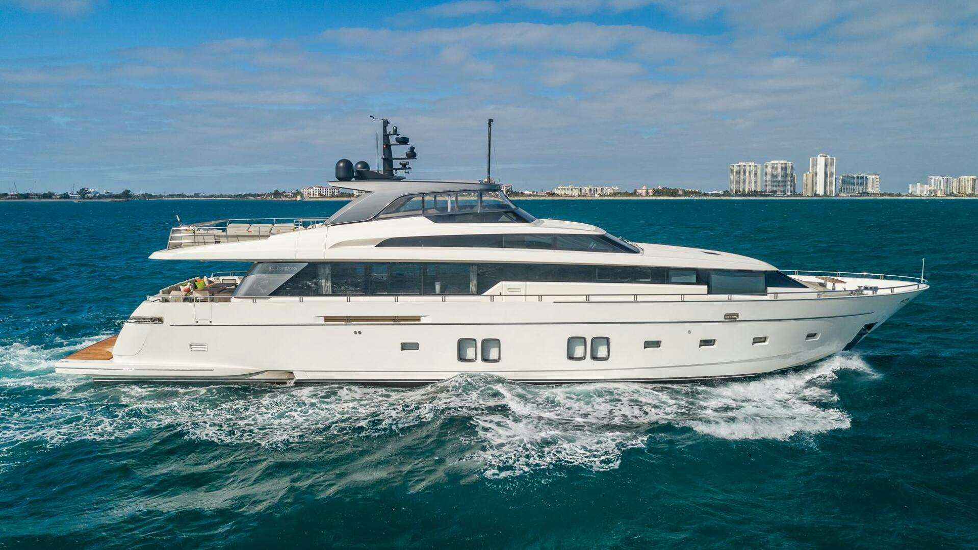 a white yacht in the water aboard XWAVE Yacht for Sale