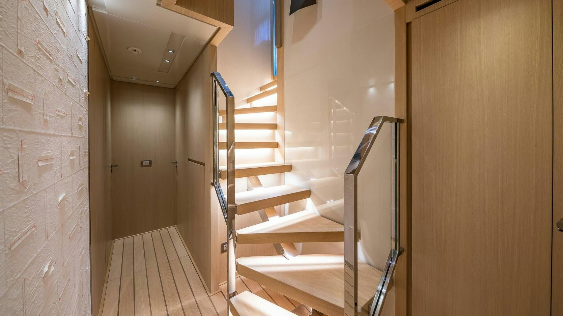 a staircase in a building aboard WOMBAT Yacht for Sale