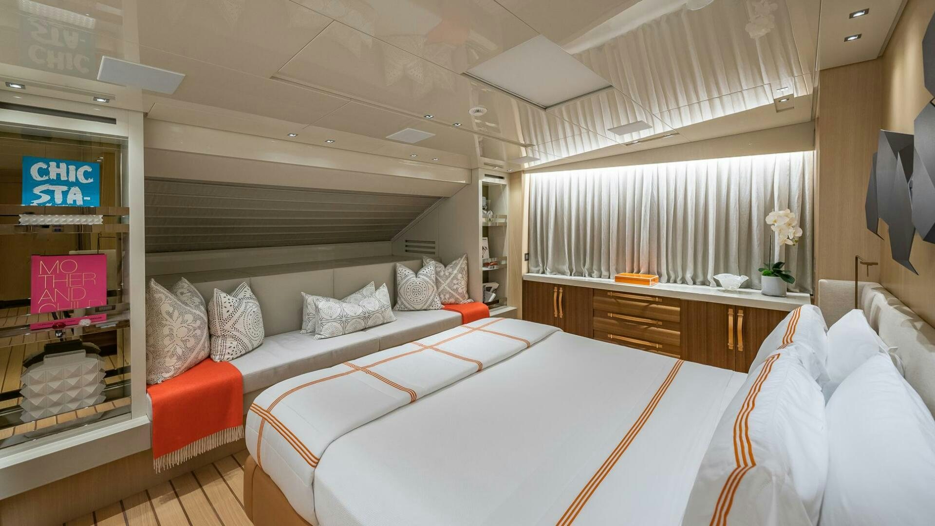 a room with a bed and a desk aboard WOMBAT Yacht for Sale