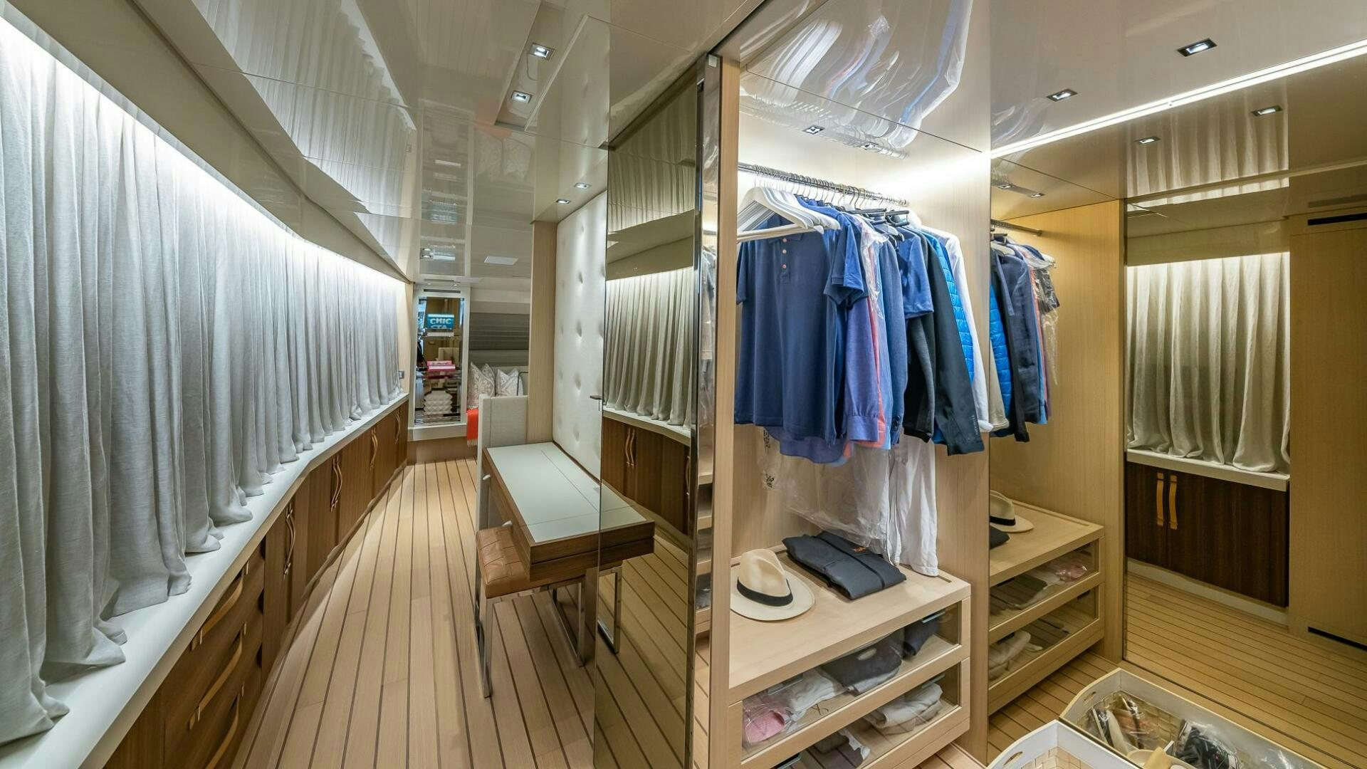 a room with a closet and a bed aboard WOMBAT Yacht for Sale