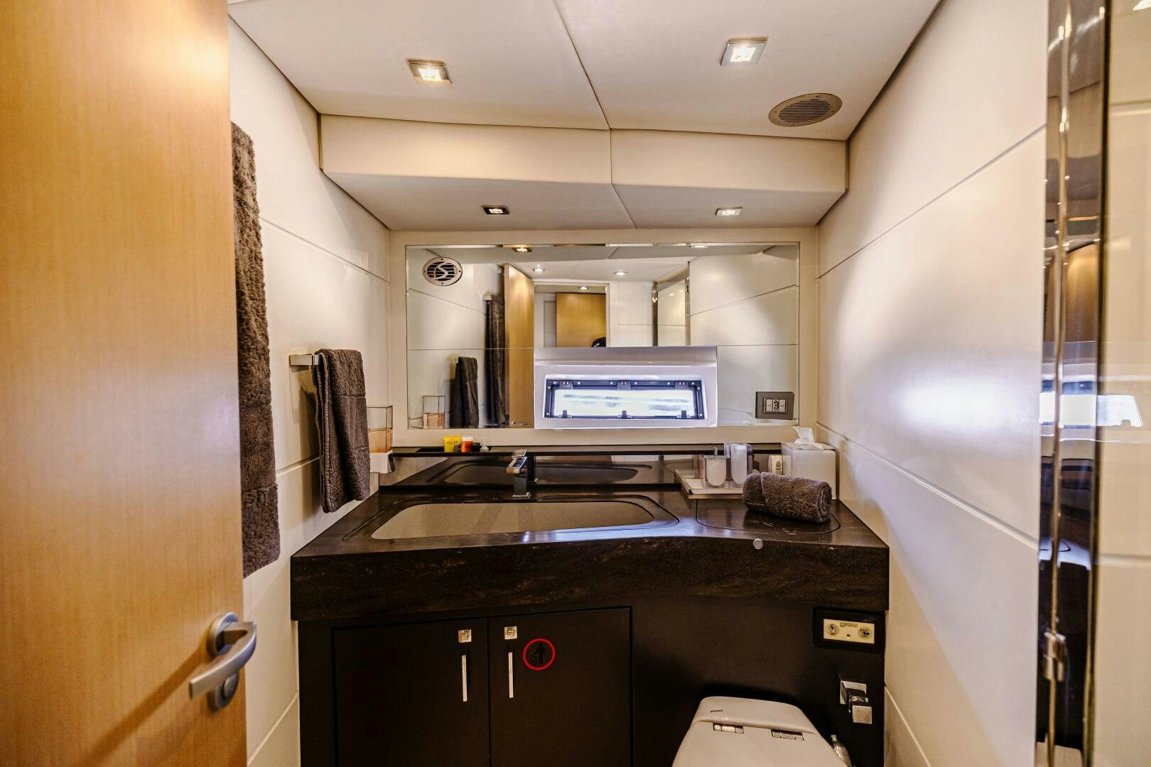 a kitchen with a microwave aboard VELOCE II Yacht for Sale