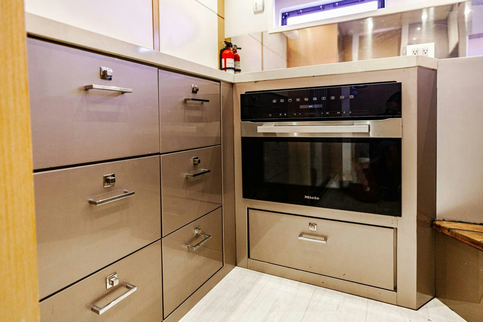 a kitchen with a microwave oven aboard VELOCE II Yacht for Sale