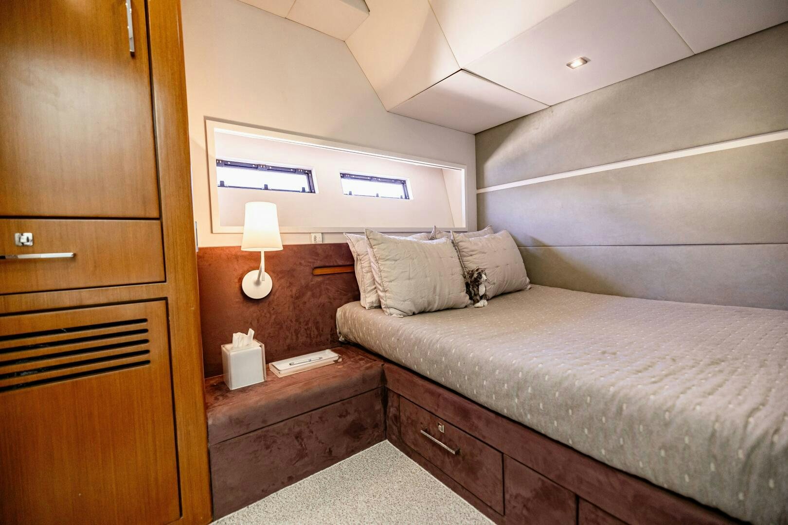 a bed in a room aboard VELOCE II Yacht for Sale