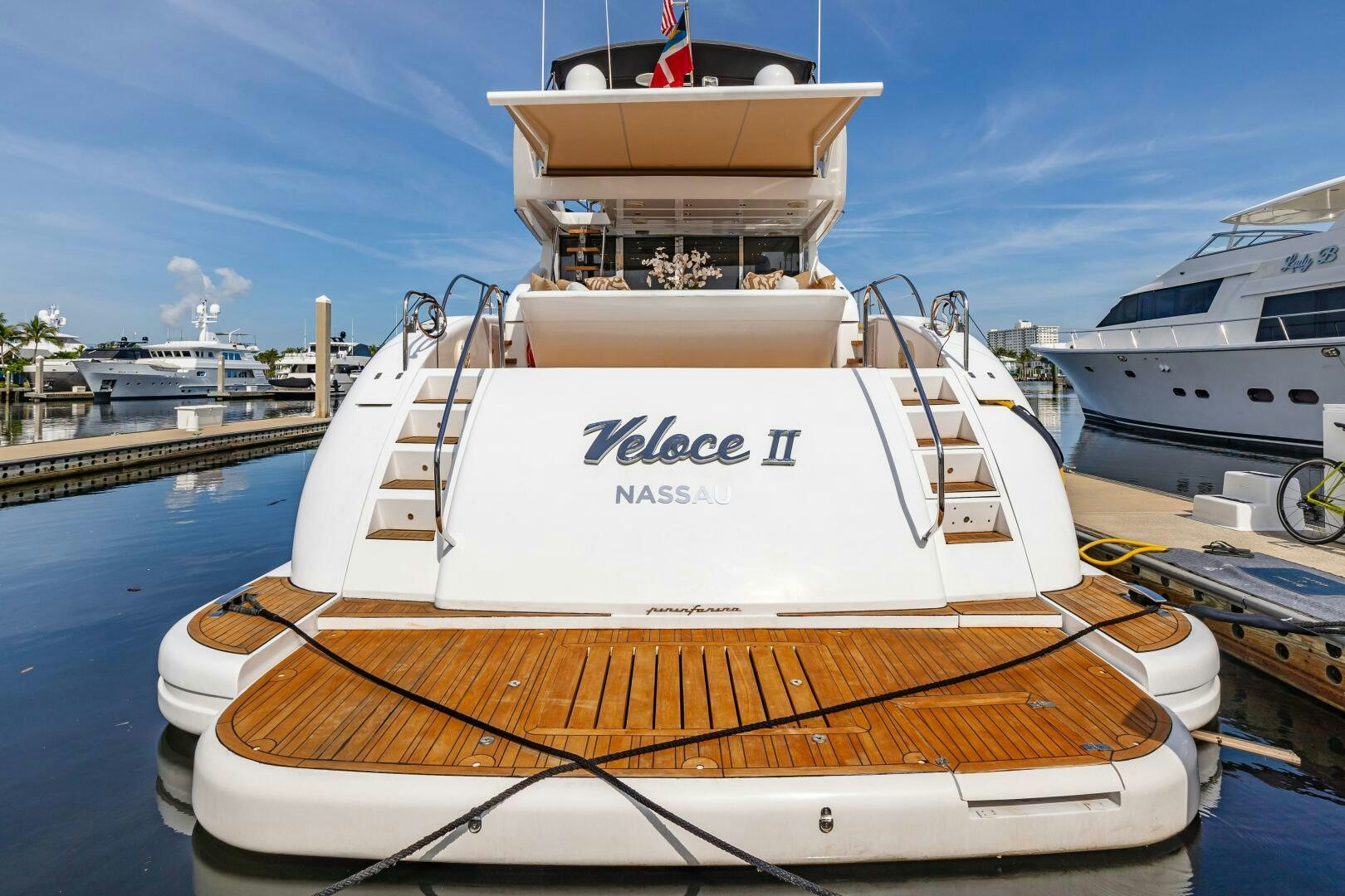 a boat docked at a pier aboard VELOCE II Yacht for Sale