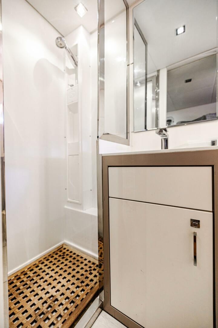 a bathroom with a shower unit aboard VELOCE II Yacht for Sale