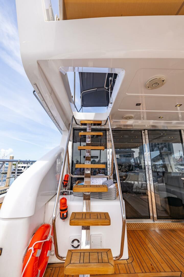 a white and black ladder on a boat aboard VELOCE II Yacht for Sale