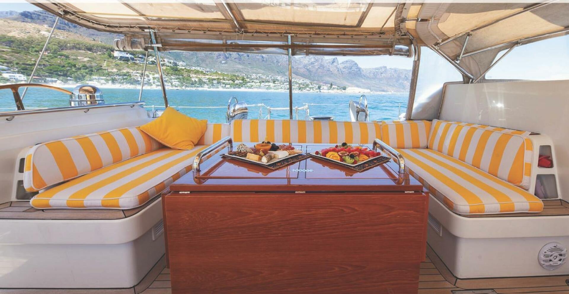 a boat with a table and chairs aboard BILLY BUDD Yacht for Sale