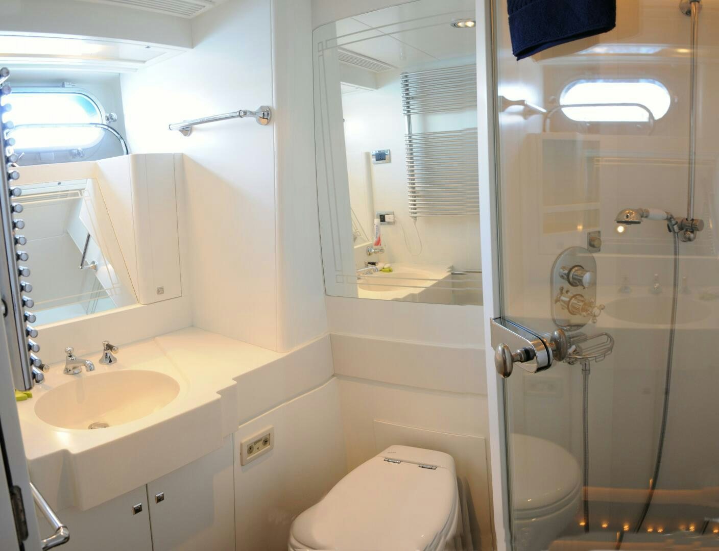 a bathroom with a glass shower aboard BILLY BUDD Yacht for Sale