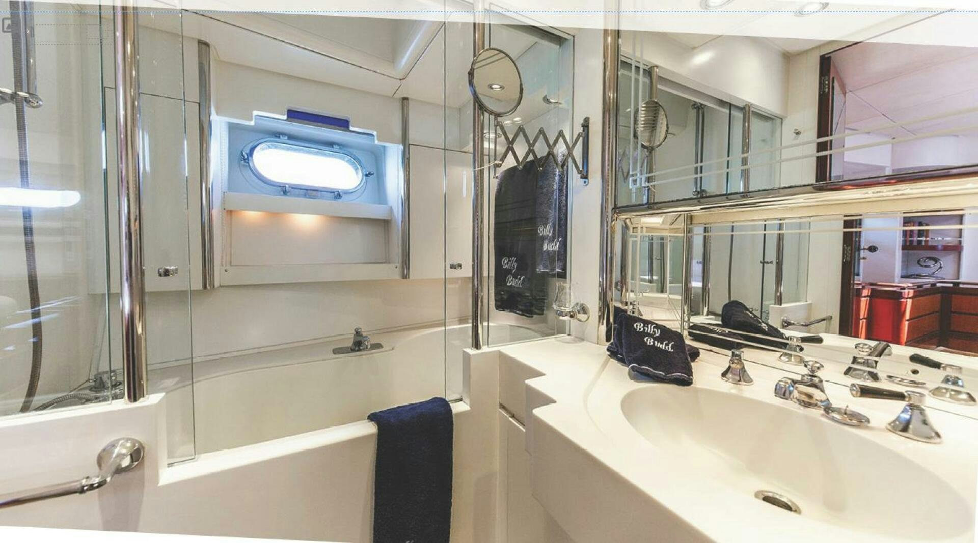 a bathroom with a sink and a mirror aboard BILLY BUDD Yacht for Sale