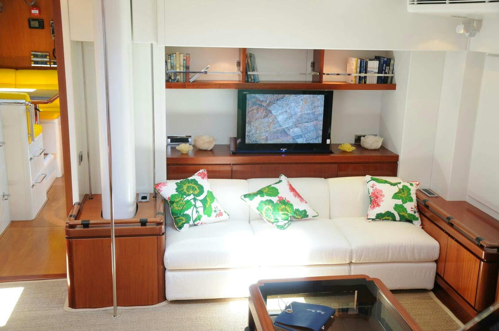 a living room with a white couch aboard BILLY BUDD Yacht for Sale