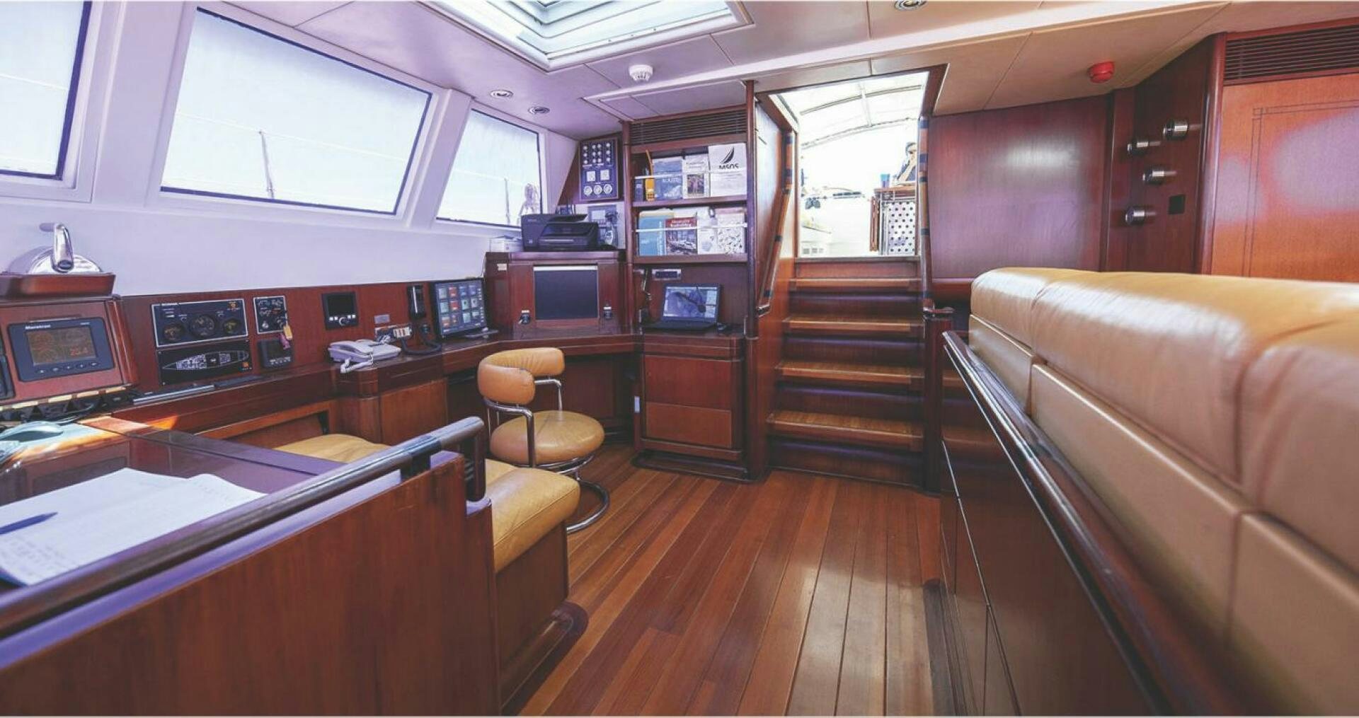 a living room with a couch and a table aboard BILLY BUDD Yacht for Sale