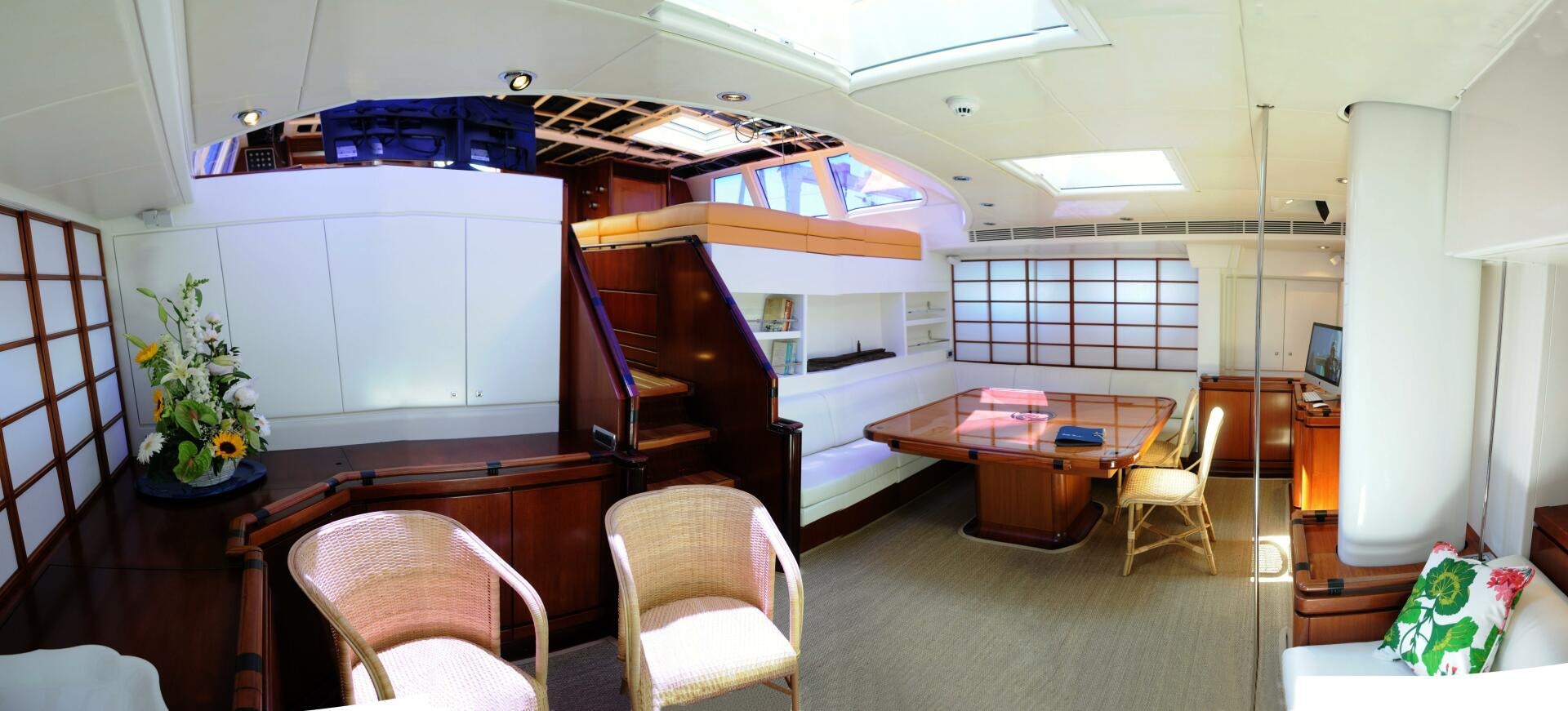 a room with a desk and chairs aboard BILLY BUDD Yacht for Sale