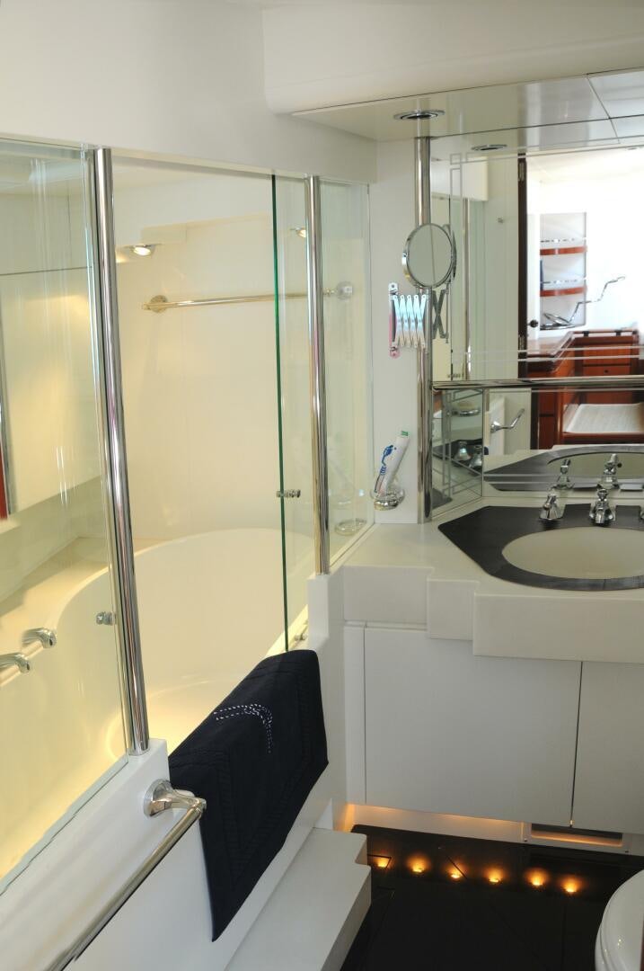 a bathroom with a shower and sink aboard BILLY BUDD Yacht for Sale