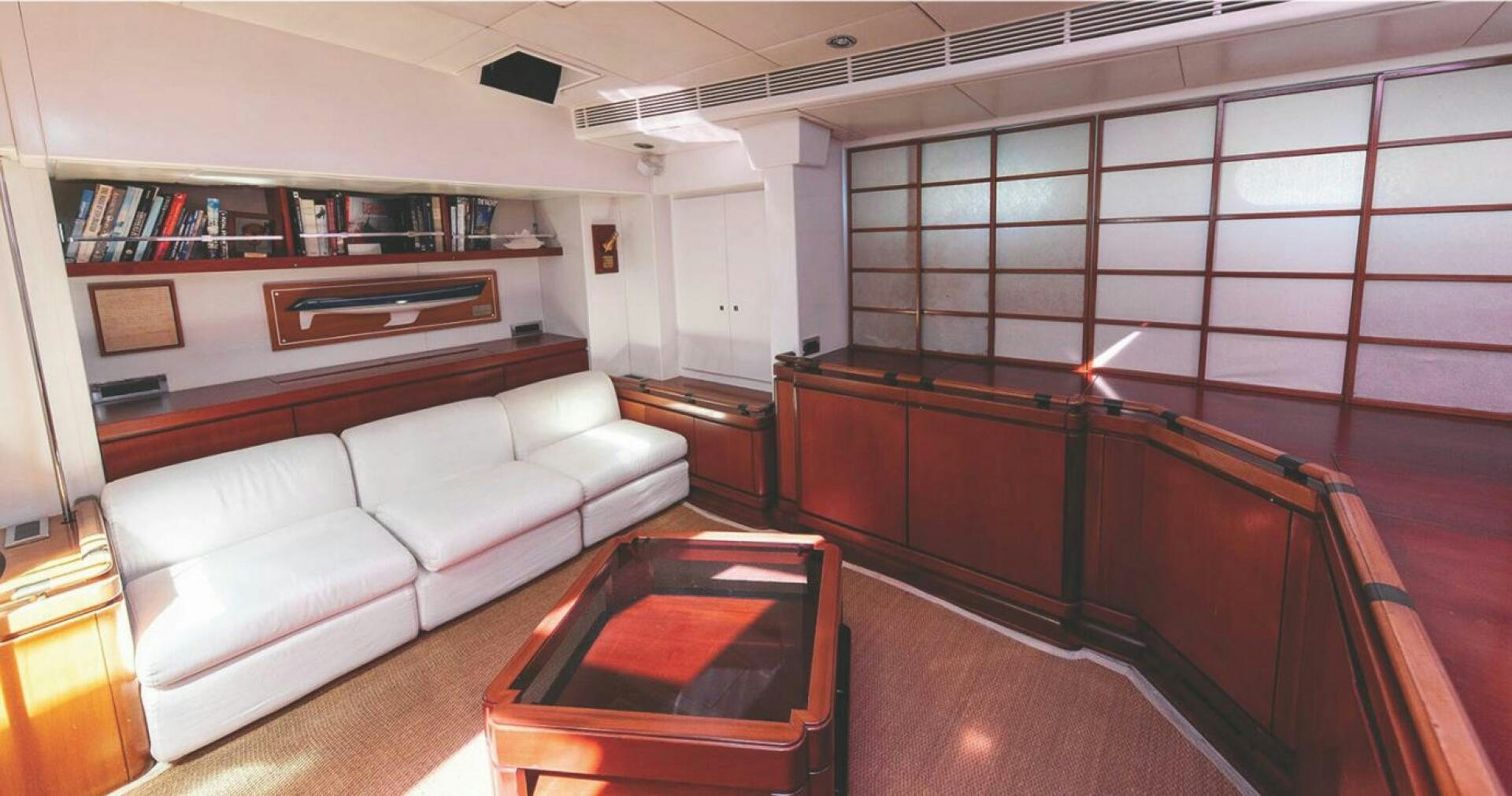 a room with a couch and a table aboard BILLY BUDD Yacht for Sale