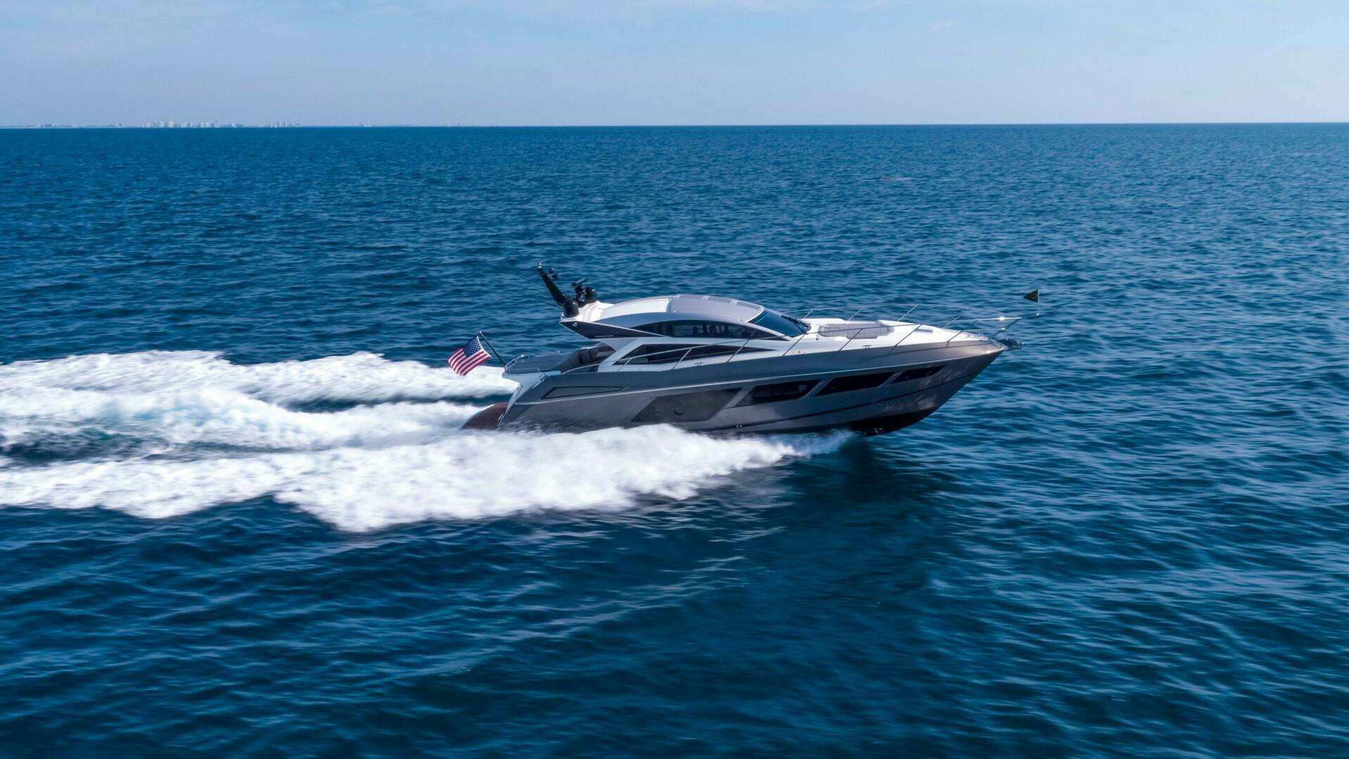 a boat on the water aboard WHEN IN Yacht for Sale