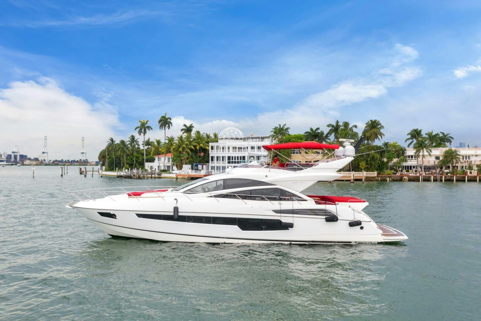 a white boat in the water aboard GEM Yacht for Sale