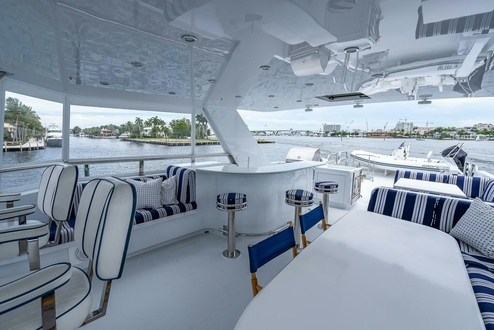 a boat with tables and chairs aboard MY WAY Yacht for Sale