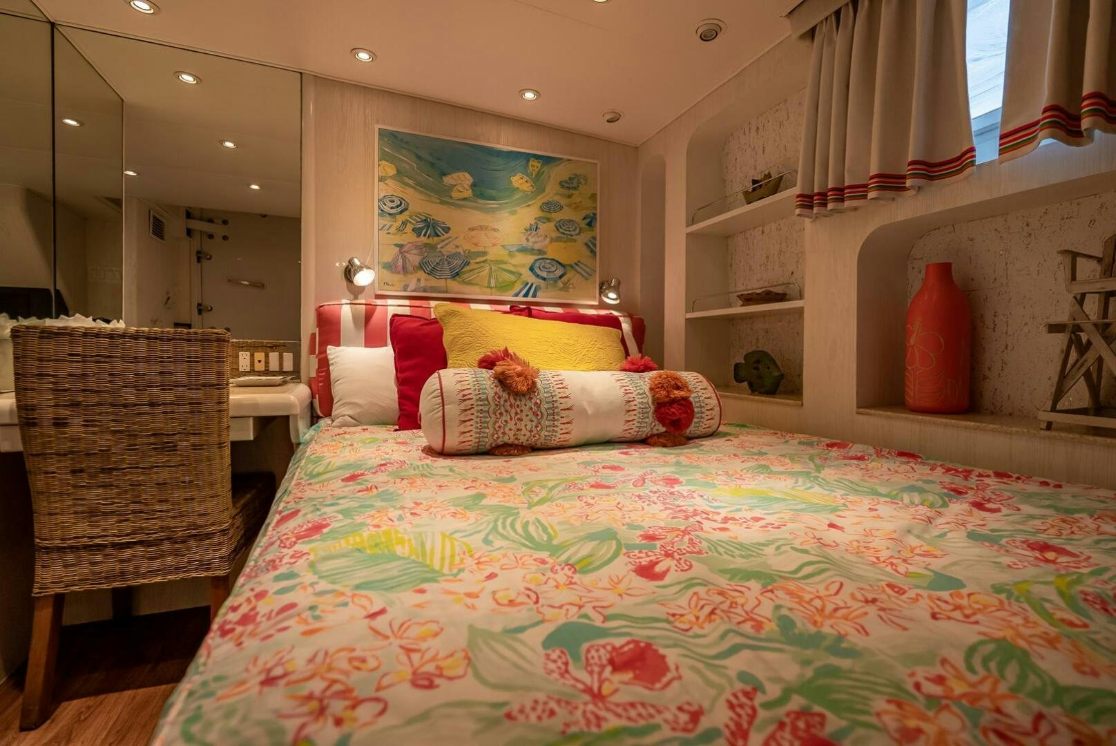 a bedroom with a bed and a chair aboard MY WAY Yacht for Sale