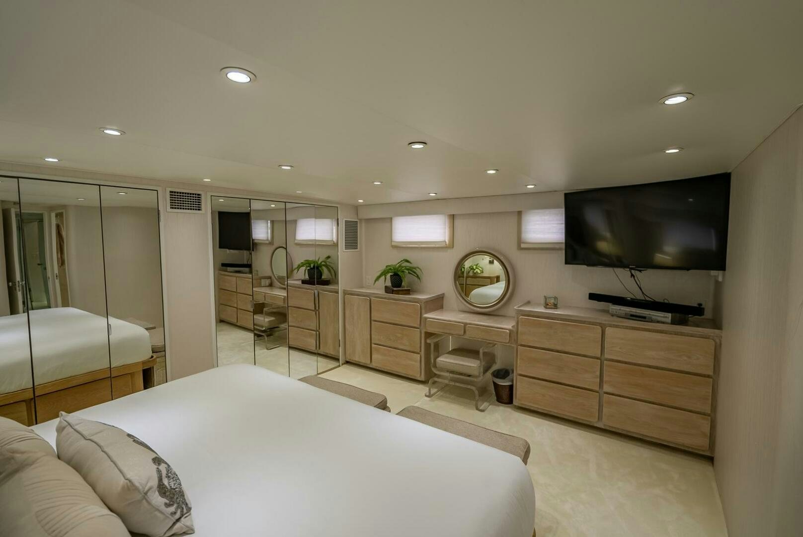 a bedroom with a large tv aboard MY WAY Yacht for Sale