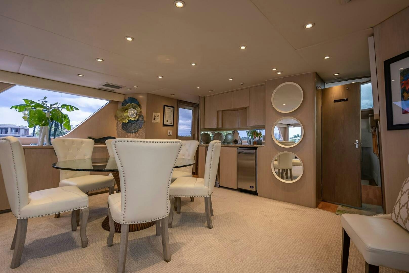a large kitchen with a dining table aboard MY WAY Yacht for Sale