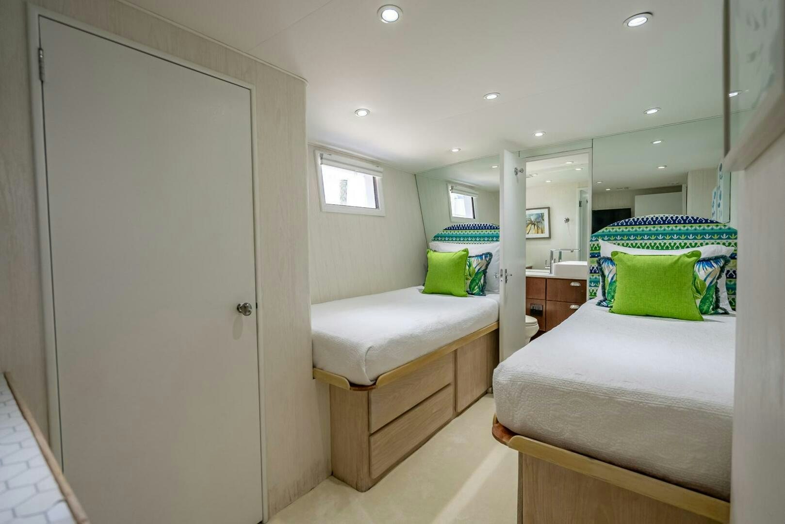 a room with a bed and a closet aboard MY WAY Yacht for Sale