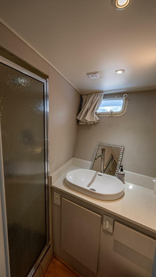 a bathroom with a sink and a shower aboard MY WAY Yacht for Sale
