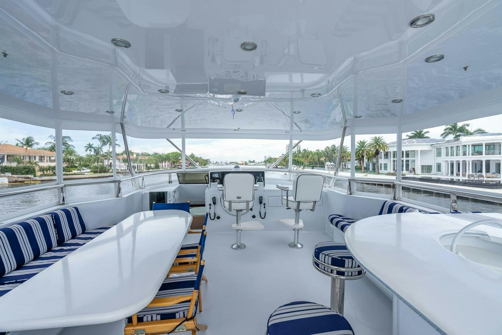 a large white tent with chairs and tables aboard MY WAY Yacht for Sale