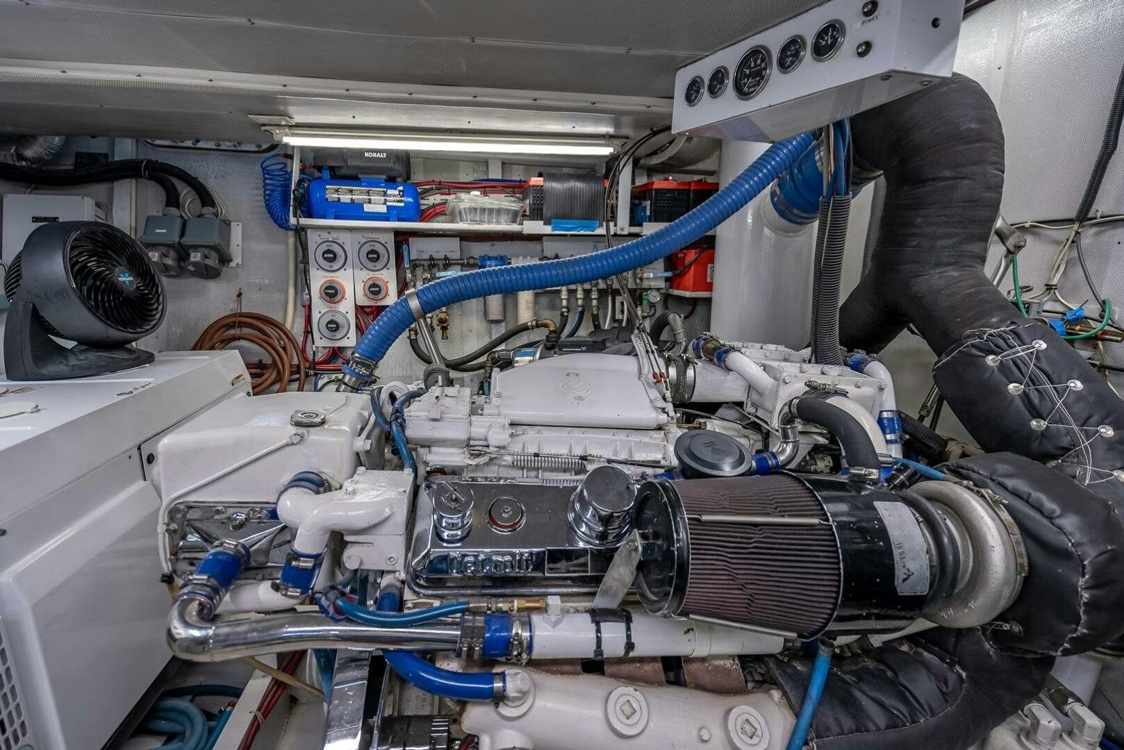 a close-up of a car engine aboard MY WAY Yacht for Sale