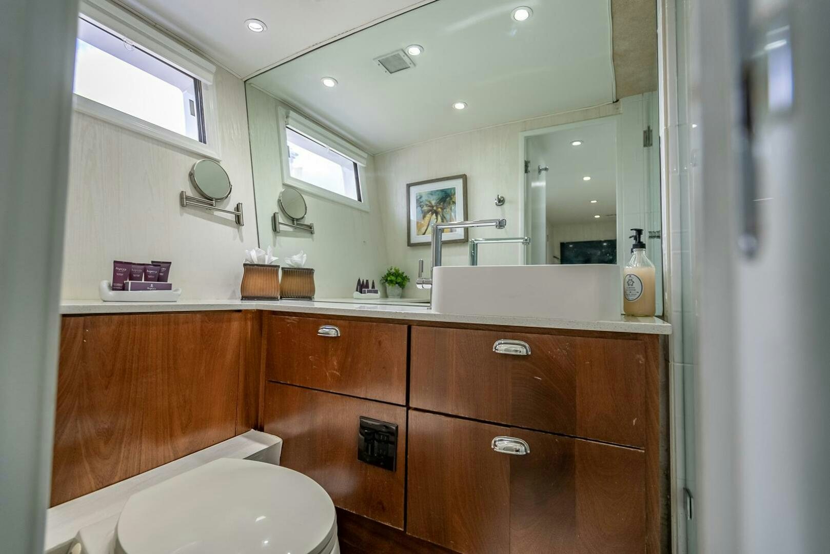 a bathroom with a large mirror aboard MY WAY Yacht for Sale