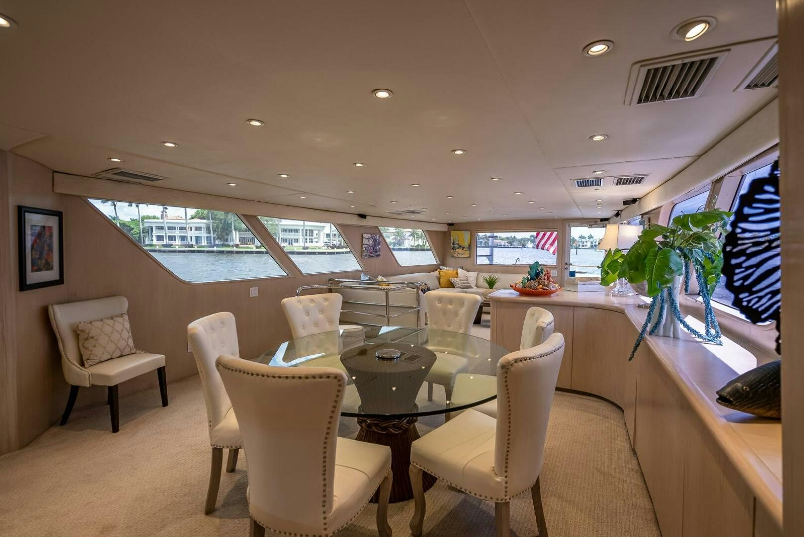 a room with a table chairs and a window aboard MY WAY Yacht for Sale