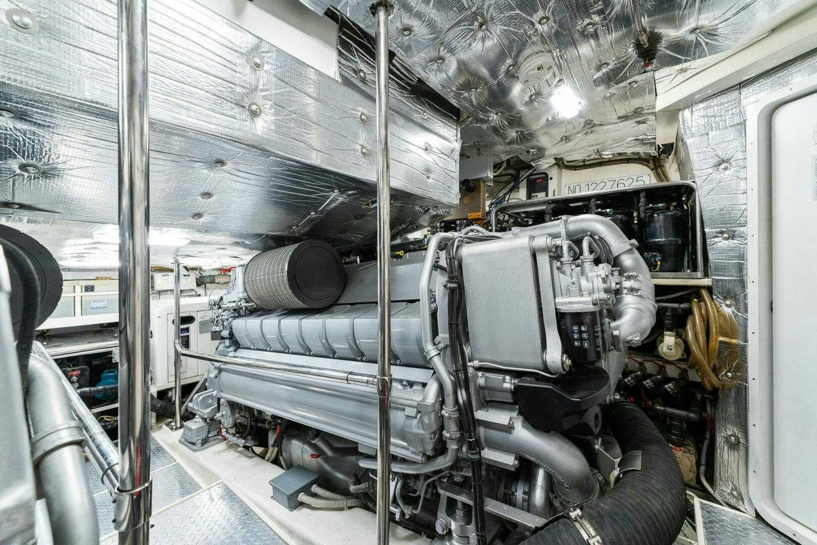 a large machine in a room aboard HAWK Yacht for Sale