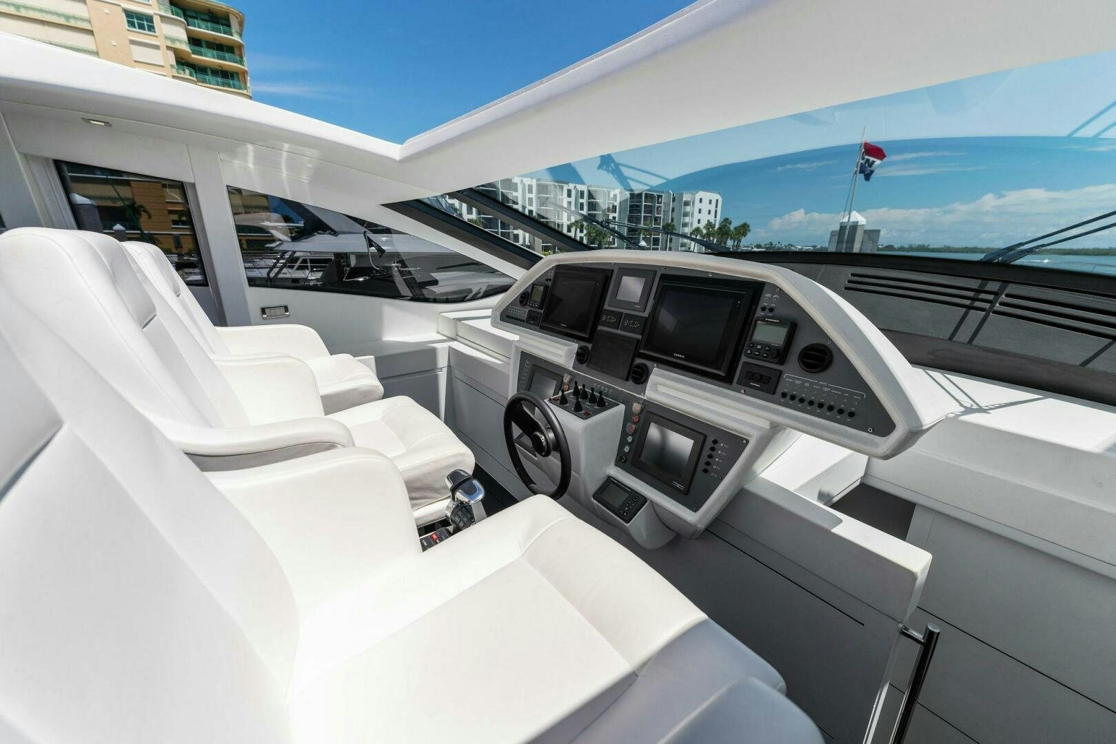 a car parked in a parking lot aboard HAWK Yacht for Sale