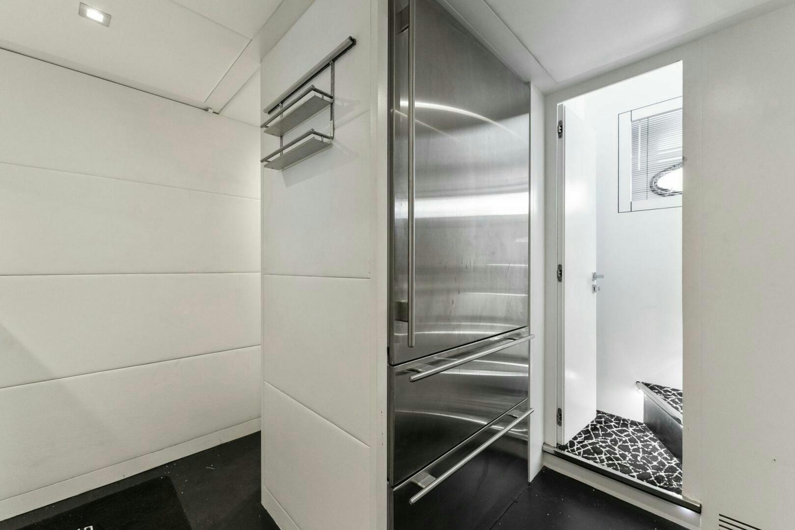 a large metal closet in a room aboard HAWK Yacht for Sale