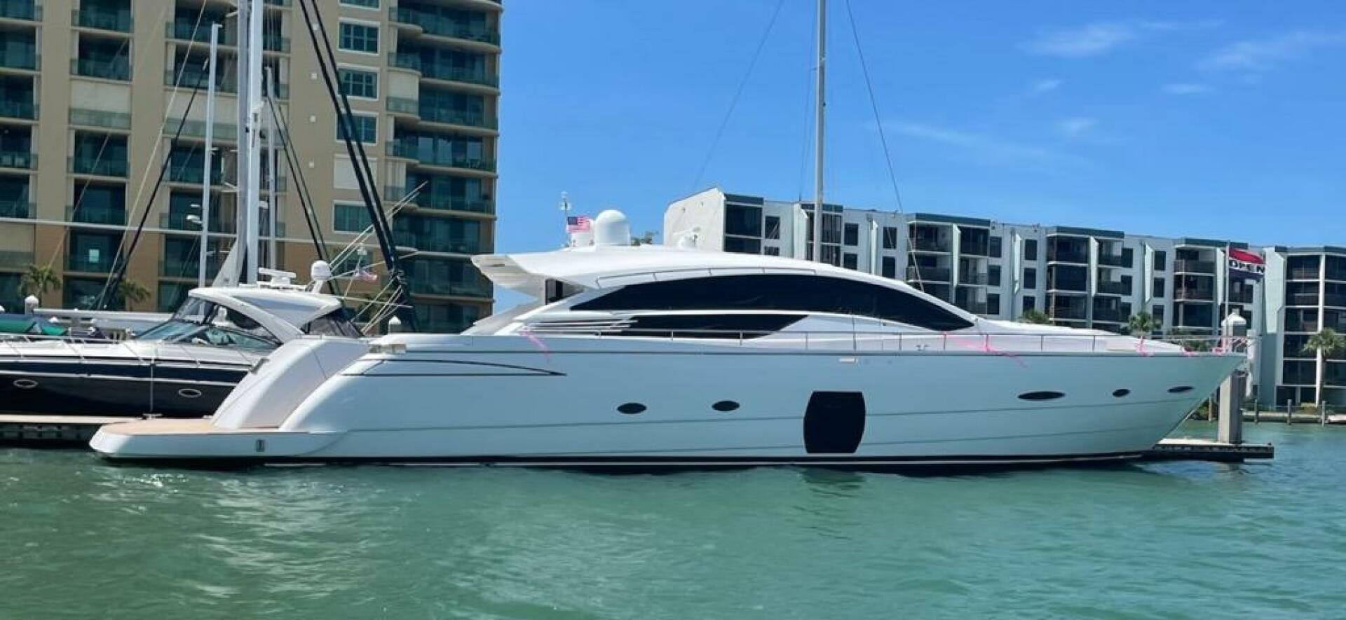 a white yacht in the water aboard HAWK Yacht for Sale