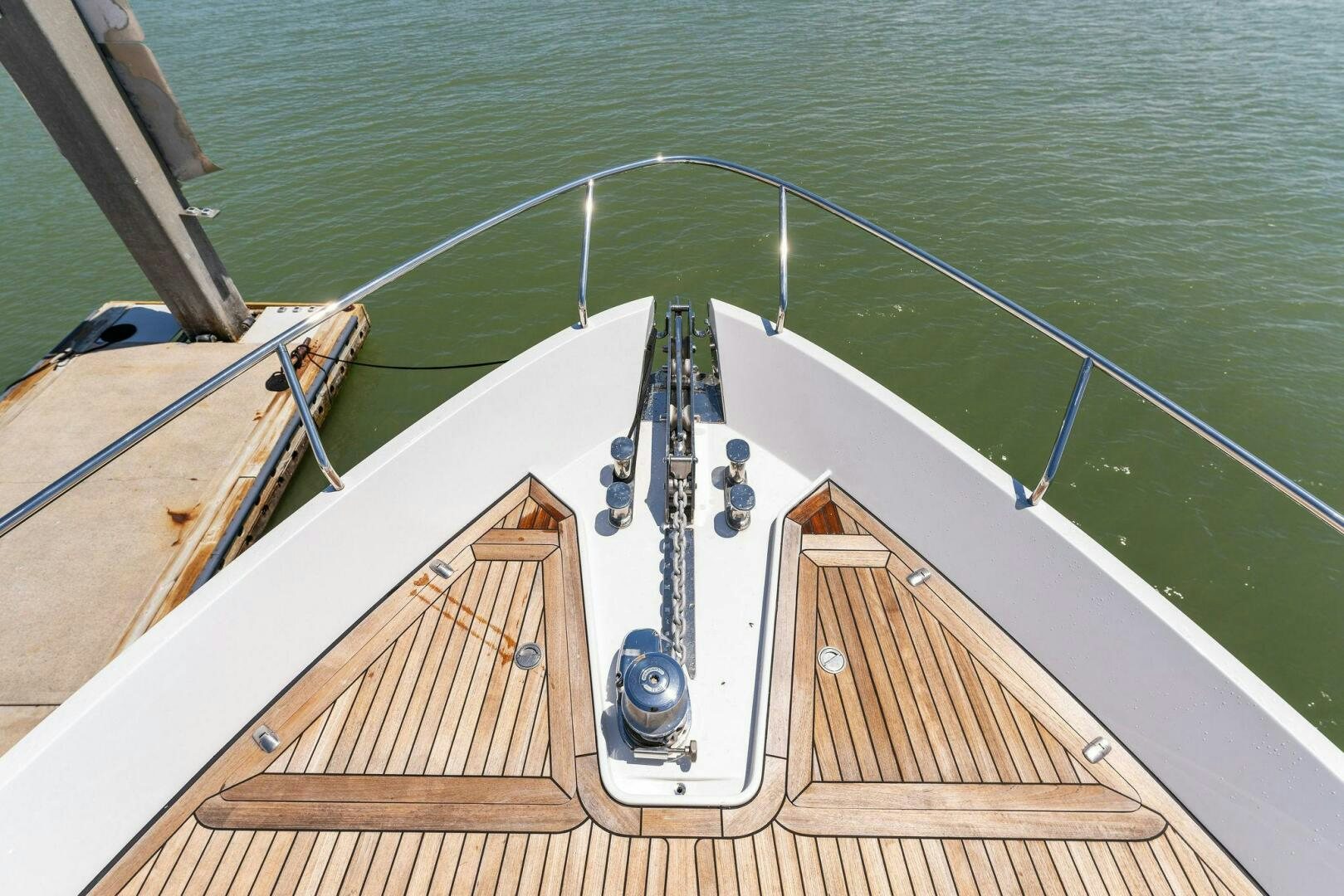 a wooden boat on a body of water aboard HAWK Yacht for Sale