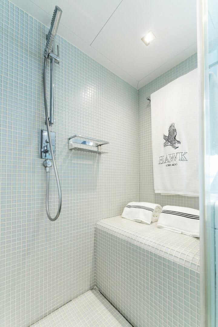 a shower unit in a bathroom aboard HAWK Yacht for Sale
