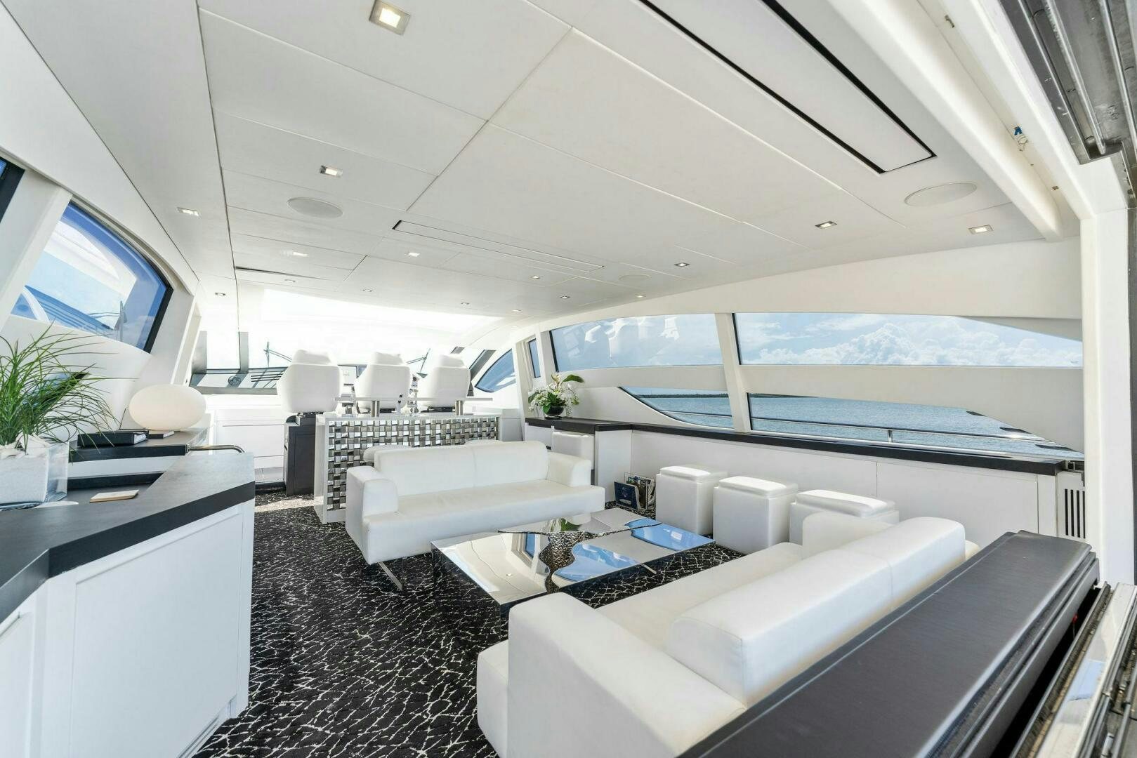 a room with a large window aboard HAWK Yacht for Sale