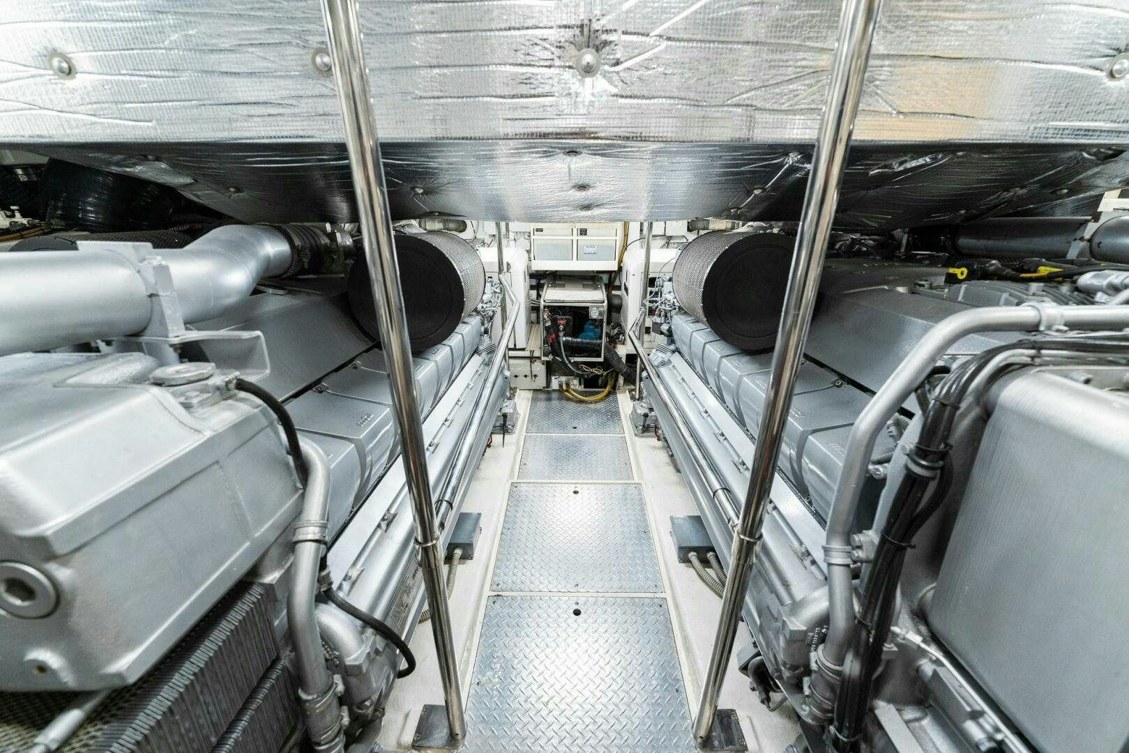 a room with metal pipes aboard HAWK Yacht for Sale