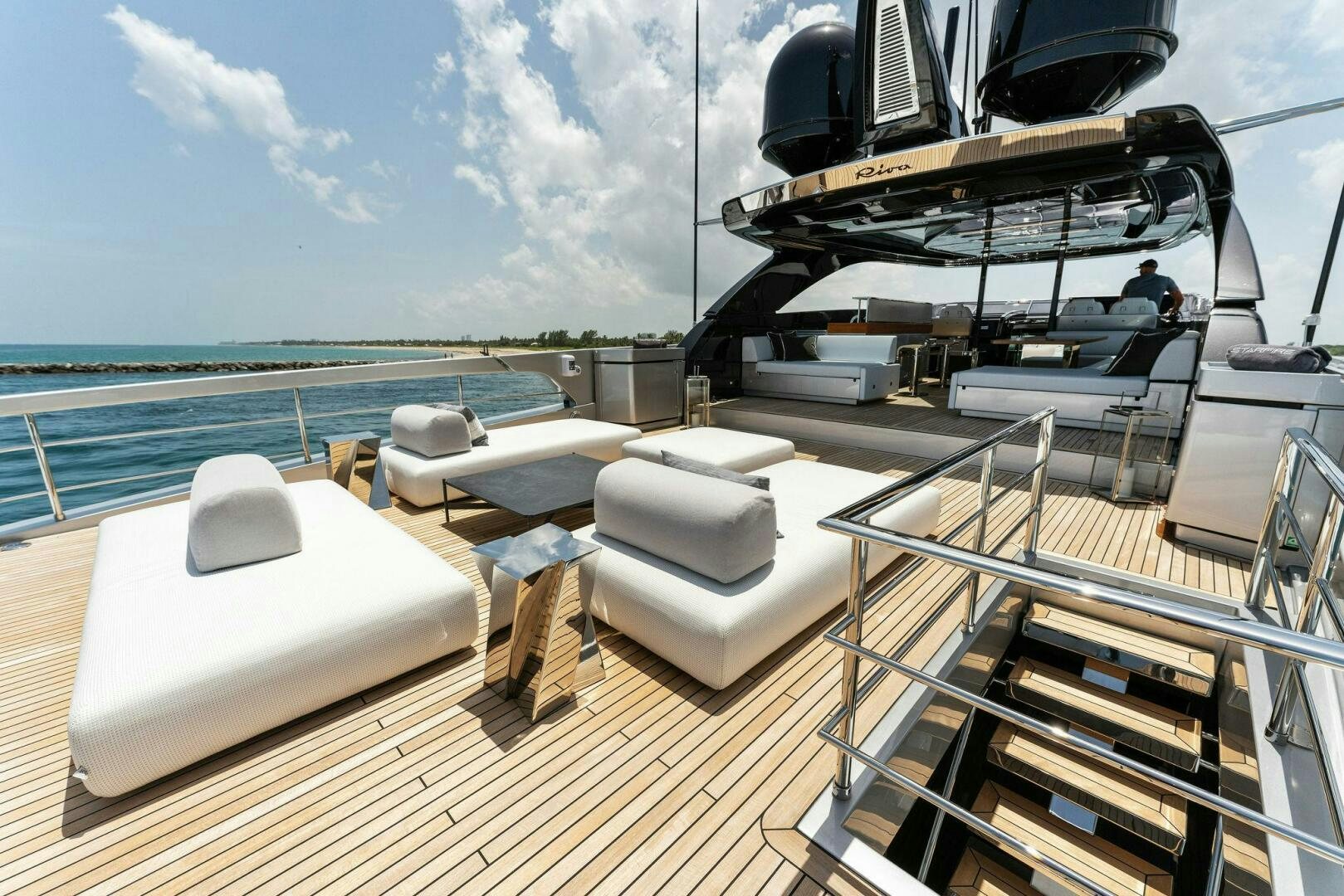 a deck with a deck and a boat on it aboard CHOP CHOP Yacht for Sale